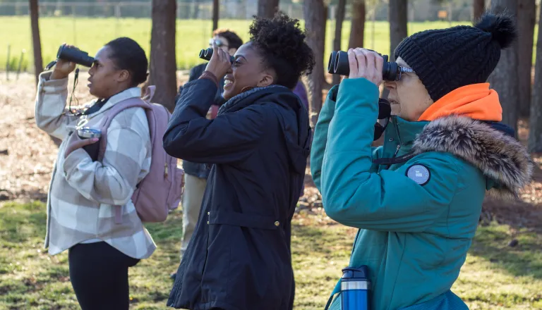 Women enjoying birdwatching