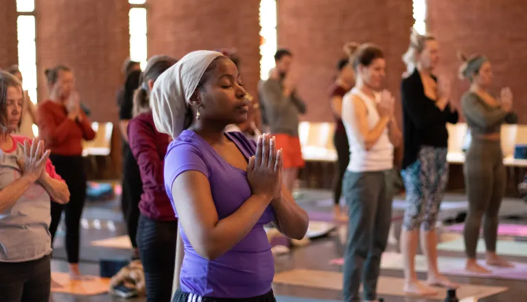 Adults participating in yoga