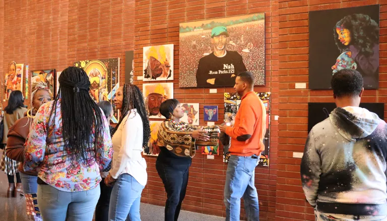 people at an art exhibit