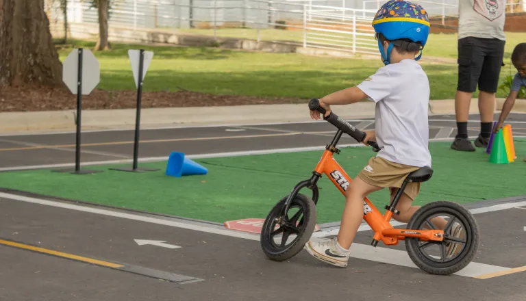 kid riding bike
