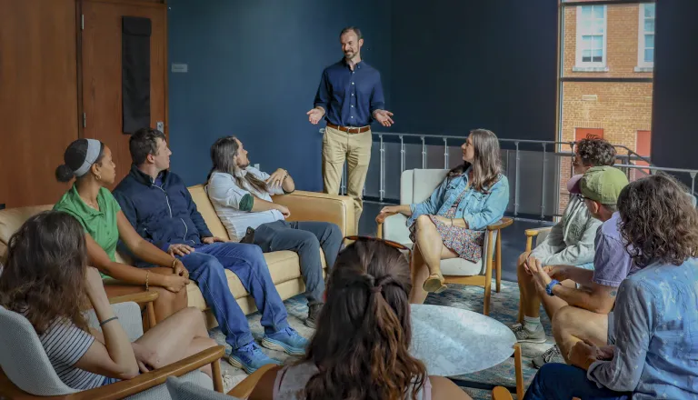 Group of people sitting in a circle
