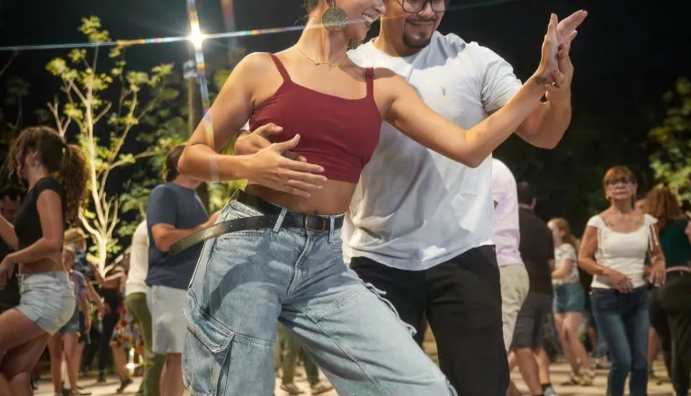 People dancing at the 2025 Oak City Music Collective Block Party at Dix Park
