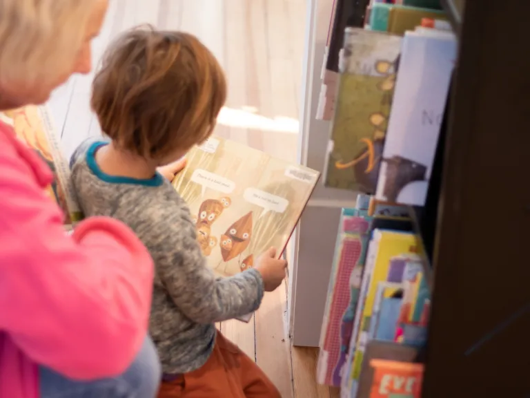Kid and a book