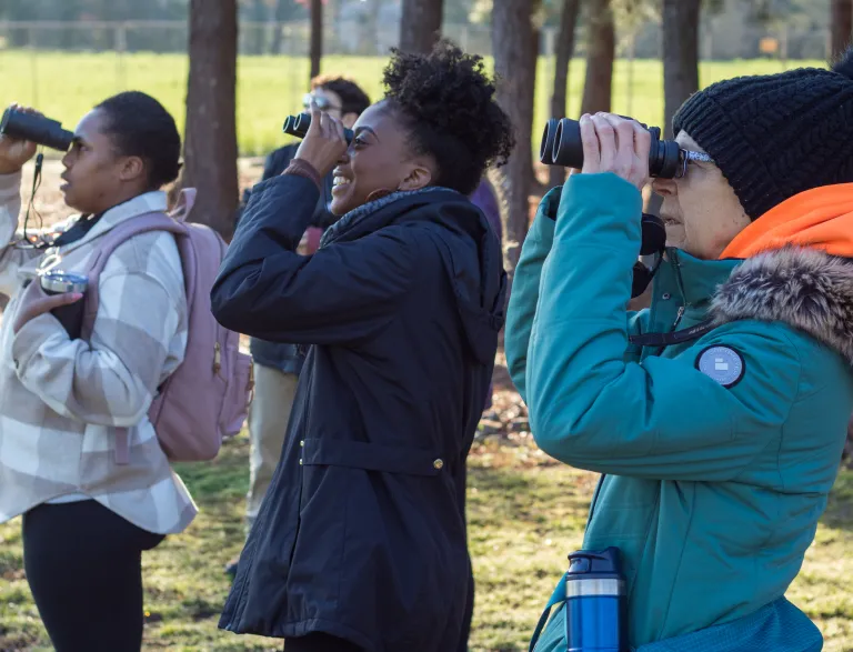 Women enjoying birdwatching