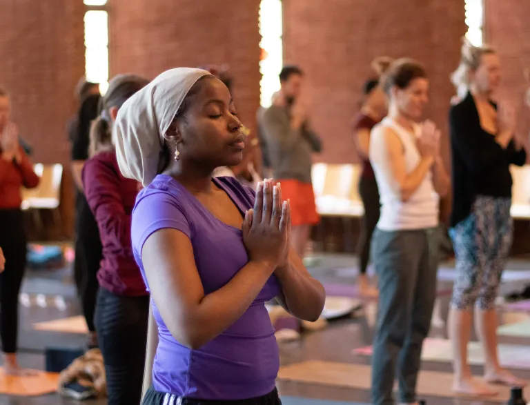 Adults participating in yoga